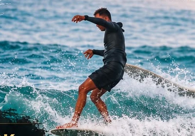 Longboard surfing on a reef wave in Sanur